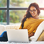 Woman Researching on Laptop